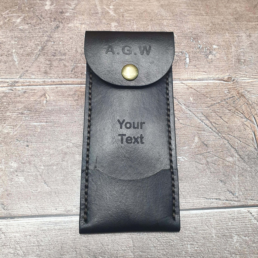 Personalized leather darts case with customized text and snap closure for dart players.